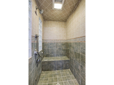 This 3,030-square-foot, 4-bedroom, 4-bathroom lake house with - photo 29
