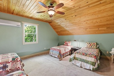 This 3,030-square-foot, 4-bedroom, 4-bathroom lake house with - photo 41
