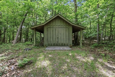 This 3,030-square-foot, 4-bedroom, 4-bathroom lake house with - photo 48