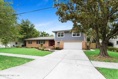 Nestled beneath a canopy of mature trees in one of - photo 3