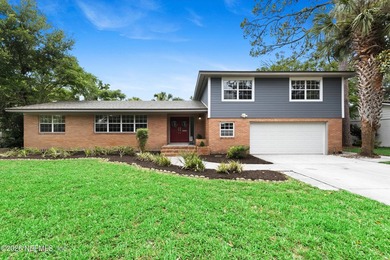 Nestled beneath a canopy of mature trees in one of - photo 4