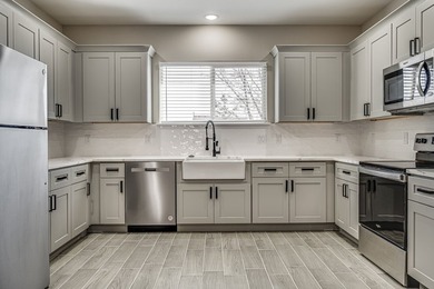 Charming newer construction home in the gated lake community of - photo 4