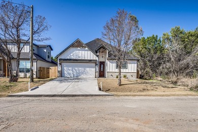 Charming newer construction home in the gated lake community of - photo 6