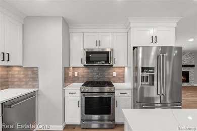 Everything is NEW in this beautifully renovated full brick ranch - photo 17