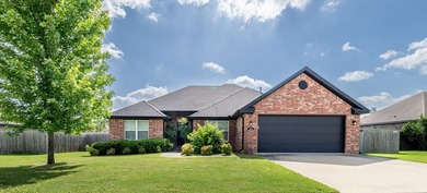 Welcome home to this immaculate, one-owner home in the highly - photo 1