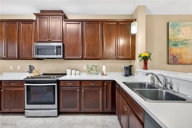 Welcome to this well-maintained first-floor condominium offering - photo 13