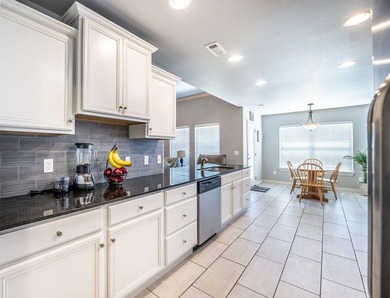 Welcome home to this immaculate, one-owner home in the highly - photo 10