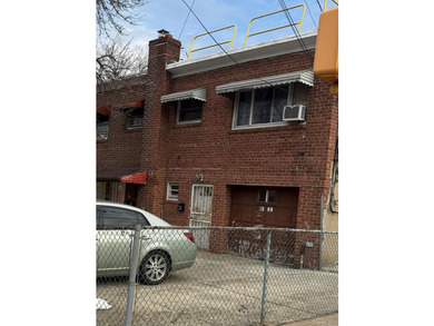 Semi-attached brick 2-family in desirable **Baychester**-a rare - photo 1