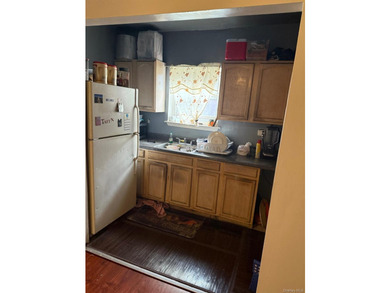 Semi-attached brick 2-family in desirable **Baychester**-a rare - photo 7