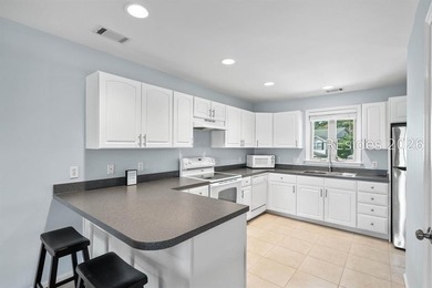 Welcome to this charming 4-bedroom, 3.5-bath townhome in the - photo 21