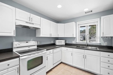 Welcome to this charming 4-bedroom, 3.5-bath townhome in the - photo 22