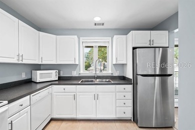 Welcome to this charming 4-bedroom, 3.5-bath townhome in the - photo 23