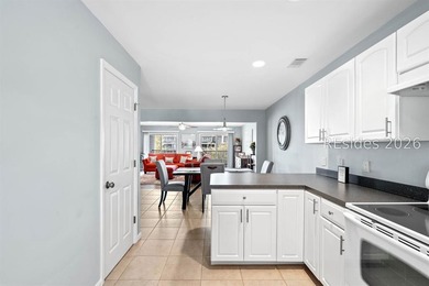Welcome to this charming 4-bedroom, 3.5-bath townhome in the - photo 24