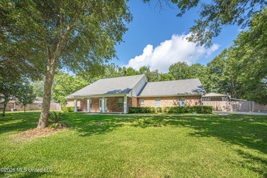 Welcome home to this spacious 3-bedroom, 2-bath brick home - photo 1