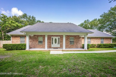 Welcome home to this spacious 3-bedroom, 2-bath brick home - photo 2