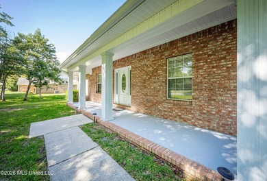 Welcome home to this spacious 3-bedroom, 2-bath brick home - photo 6