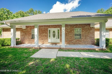 Welcome home to this spacious 3-bedroom, 2-bath brick home - photo 7