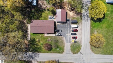 Nestled on a spacious corner lot in East Jordan, 109 Pine St - photo 31