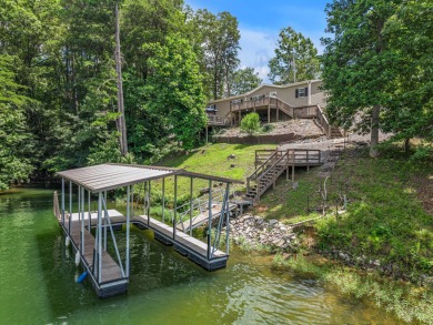 Smith Lake (Rock Creek) Tucked away in a private cove is this - Lake Home For Sale in Crane Hill, Alabama