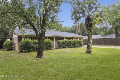 This charming home features a fenced backyard with a saltwater - photo 2
