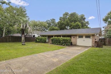 This charming home features a fenced backyard with a saltwater - photo 3