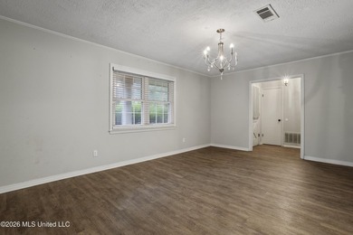 This charming home features a fenced backyard with a saltwater - photo 4