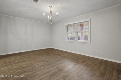 This charming home features a fenced backyard with a saltwater - photo 5