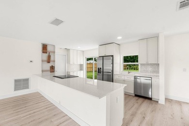 Welcome to this charming three-bedroom, two-bathroom - photo 8