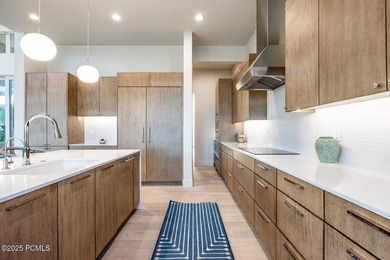 Some homes have views. Some have design. A rare few have both - photo 11