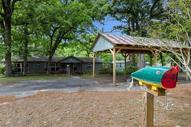 Tucked away in the towering pineywoods of East Texas, this - photo 14