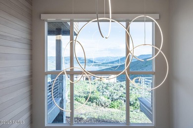 Some homes have views. Some have design. A rare few have both - photo 23
