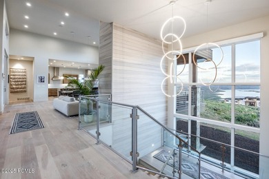 Some homes have views. Some have design. A rare few have both - photo 24