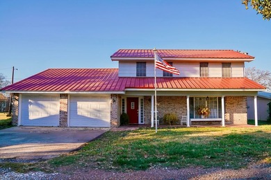 Spacious 5-bedroom lake home offering multiple use options as a - photo 2