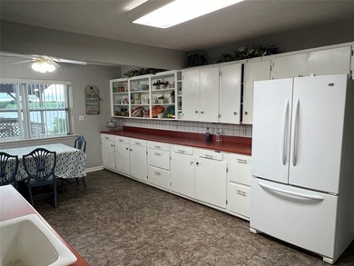 Spacious 5-bedroom lake home offering multiple use options as a - photo 6