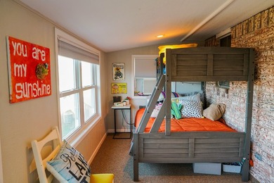 Spacious 5-bedroom lake home offering multiple use options as a - photo 7