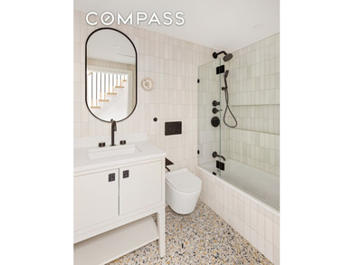 A rare Red Hook townhouse offering two separate residences on - photo 11