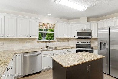 Welcome to 5205 River Park Villas Drive, a timeless brick home - photo 12