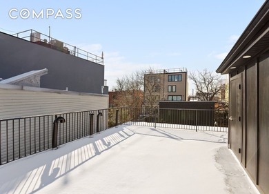 A rare Red Hook townhouse offering two separate residences on - photo 12