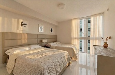 Experience the pinnacle of coastal luxury in this fully - photo 12