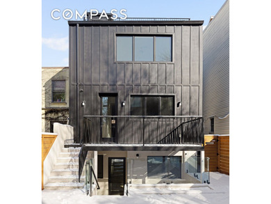 A rare Red Hook townhouse offering two separate residences on - photo 15