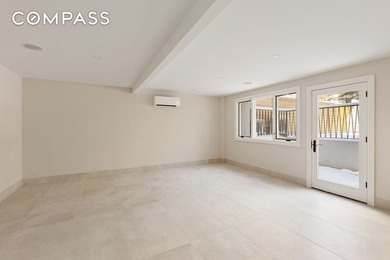A rare Red Hook townhouse offering two separate residences on - photo 17