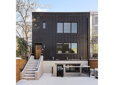 A rare Red Hook townhouse offering two separate residences on - photo 19