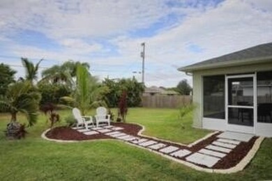 Welcome to this charming single-story residence located in Port - photo 7