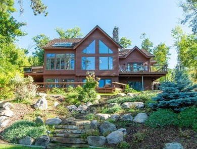 Don't miss this stunning Gull Lake home. This custom built home - photo 1