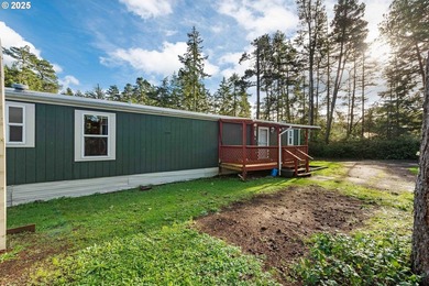 This well cared-for manufactured home in Dunes Mobile offers a - photo 2