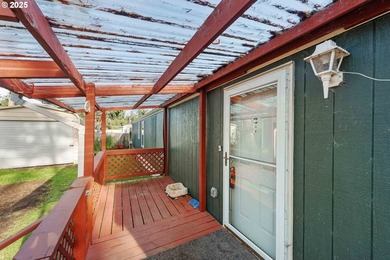 This well cared-for manufactured home in Dunes Mobile offers a - photo 3