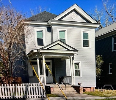 This two-story multi-family home, originally built in 1920 - photo 1