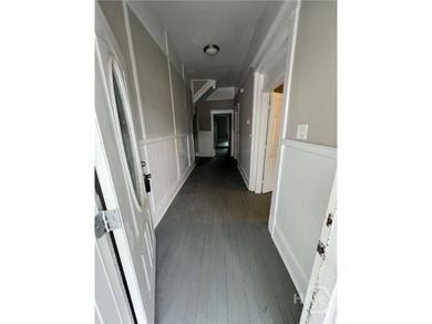 This two-story multi-family home, originally built in 1920 - photo 3