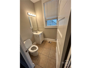 This two-story multi-family home, originally built in 1920 - photo 8