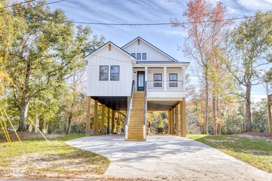Discover the Height of Refined Living at 4441 Audubon Trail in - photo 1